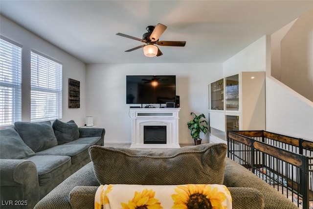 1200 Mission View Ct, Henderson, NV 89002 - living area with ceiling fan and a glass covered fireplace