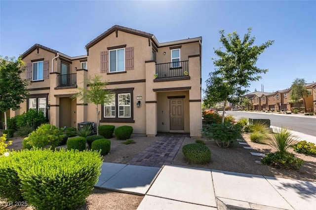 1200 Mission View Ct, Henderson, NV 89002 - view of property featuring stucco siding, a balcony, and a residential view