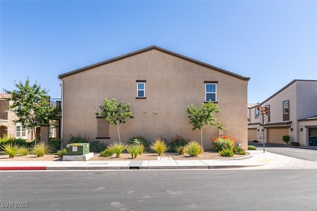 1200 Mission View Ct, Henderson, NV 89002 - view of side of property with stucco siding