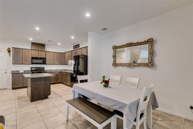 1200 Mission View Ct, Henderson, NV 89002 - dining space with light tile patterned floors and recessed lighting