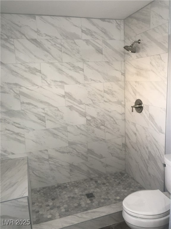 8484 Montana Stream Ave, Las Vegas, NV 89113 - full bath featuring tiled shower and toilet