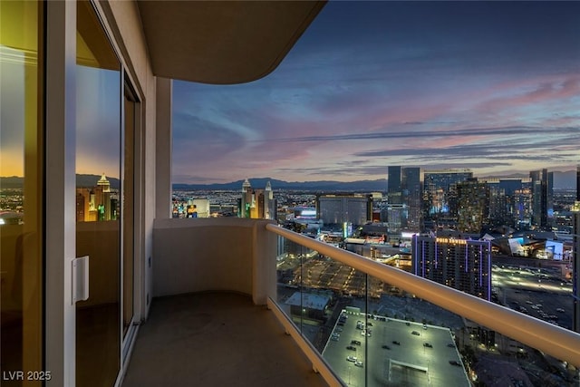 145 E Harmon Ave Unit 3705, Las Vegas, NV 89109 - balcony at dusk featuring a city view