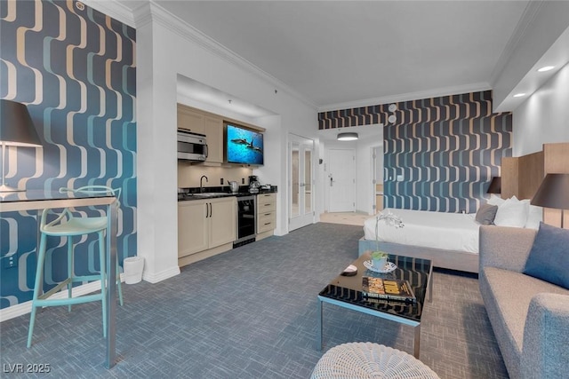 145 E Harmon Ave Unit 3705, Las Vegas, NV 89109 - carpeted living area with ornamental molding, beverage cooler, and wet bar