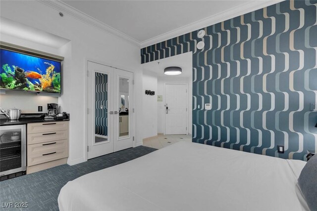 145 E Harmon Ave Unit 3705, Las Vegas, NV 89109 - bedroom featuring beverage cooler, dark colored carpet, ornamental molding, and french doors