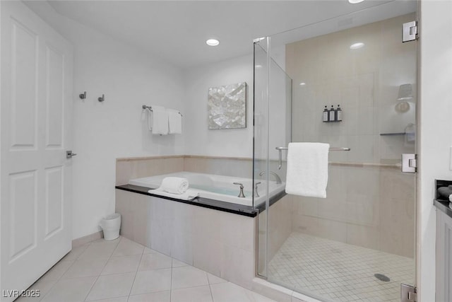145 E Harmon Ave Unit 3705, Las Vegas, NV 89109 - full bathroom with tile patterned floors, a shower stall, and a bath