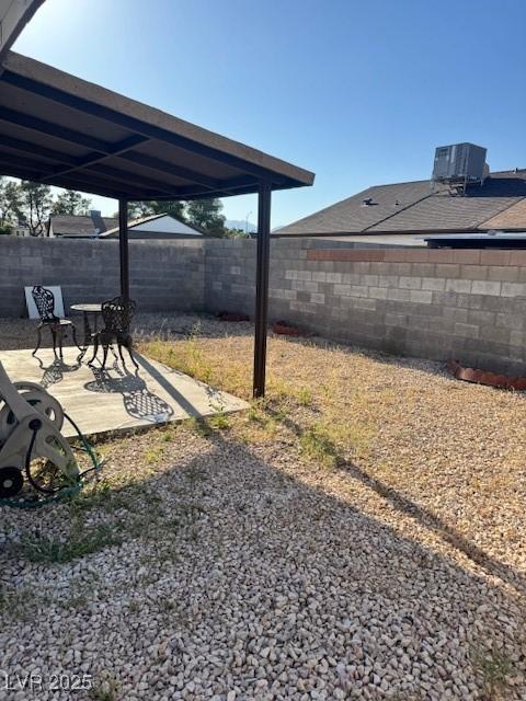 7144 Forest Vista St, Las Vegas, NV 89147 - fenced backyard featuring a patio area