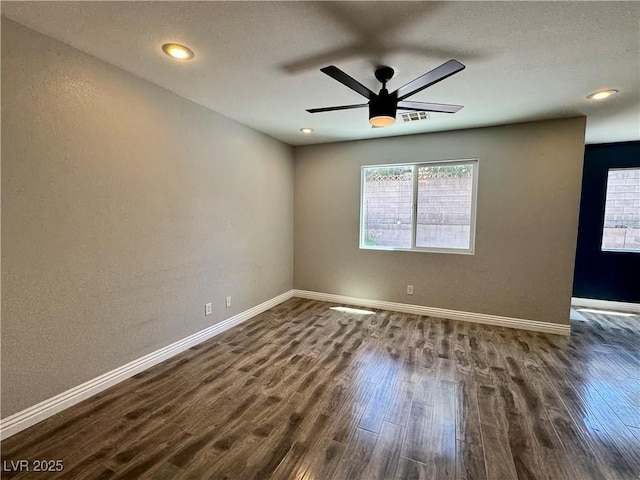 9165 Beauchamp Ave, Las Vegas, NV 89148 - spare room with healthy amount of natural light, dark wood-style floors, a ceiling fan, and recessed lighting