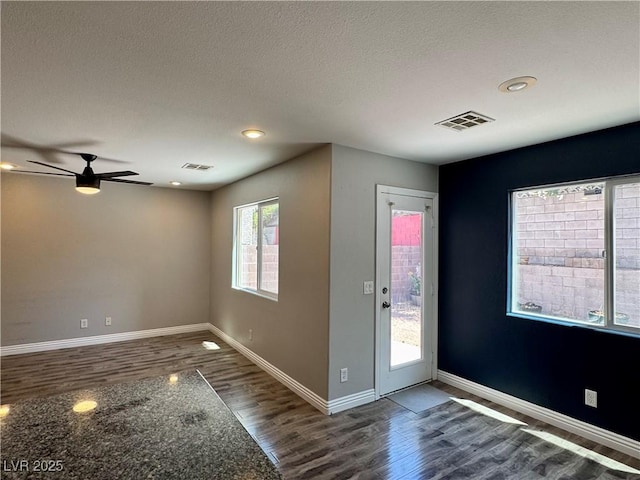 9165 Beauchamp Ave, Las Vegas, NV 89148 - foyer entrance featuring wood finished floors, a ceiling fan, recessed lighting, and a textured ceiling