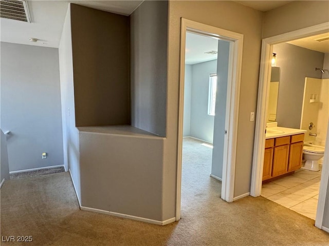 9165 Beauchamp Ave, Las Vegas, NV 89148 - hall featuring light colored carpet and baseboards