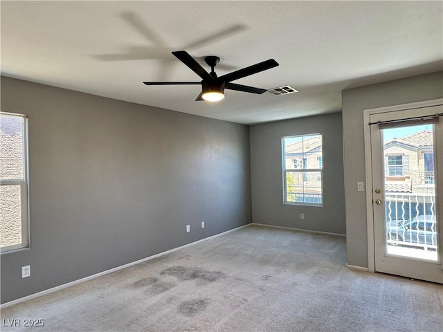 9165 Beauchamp Ave, Las Vegas, NV 89148 - unfurnished room featuring light colored carpet and a ceiling fan