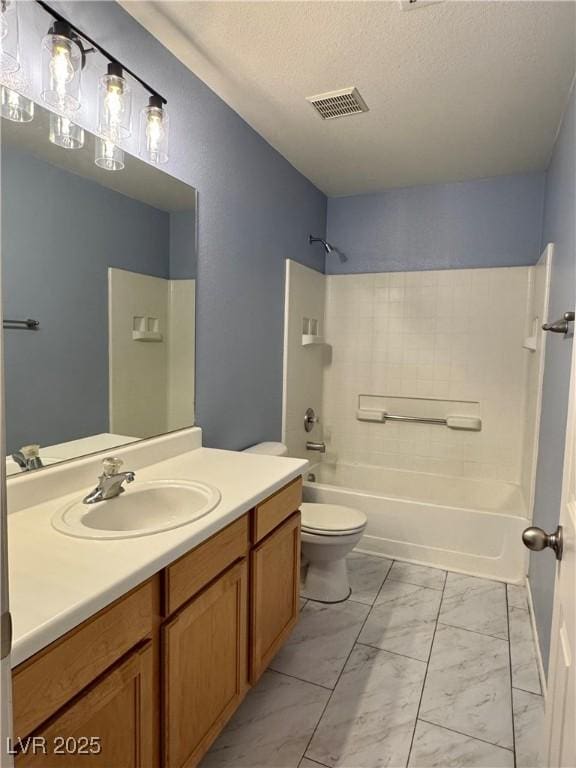 9165 Beauchamp Ave, Las Vegas, NV 89148 - full bath with marble look tiles, vanity, bathing tub / shower combination, and a textured ceiling