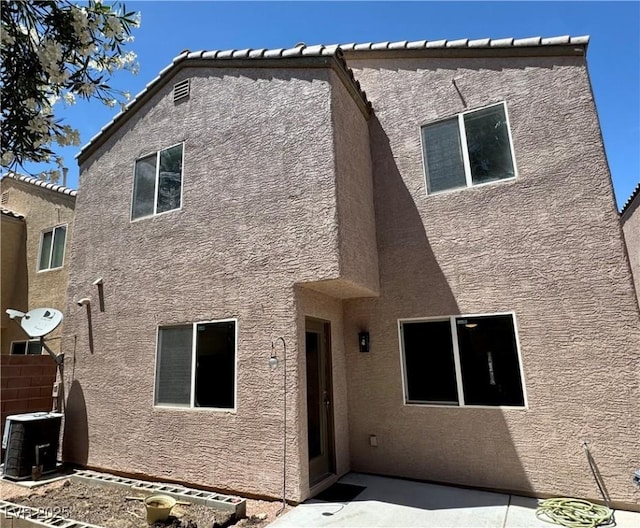 9165 Beauchamp Ave, Las Vegas, NV 89148 - rear view of property featuring stucco siding