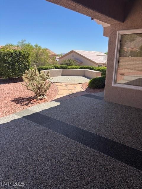 10036 Keysborough Dr, Las Vegas, NV 89134 - view of yard with a patio area
