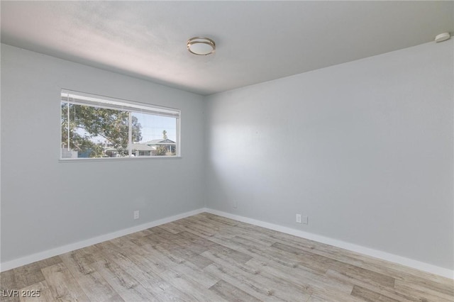 6317 Alta Dr, Las Vegas, NV 89107 - spare room featuring wood finished floors
