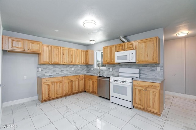 6317 Alta Dr, Las Vegas, NV 89107 - kitchen featuring white appliances, light marble finish floors, backsplash, and light stone countertops