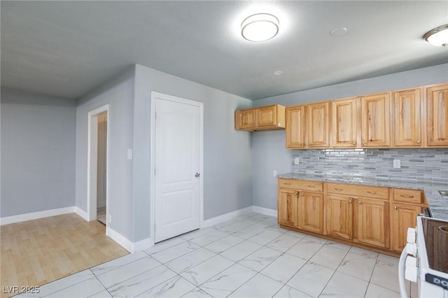 6317 Alta Dr, Las Vegas, NV 89107 - kitchen featuring white range with electric stovetop, decorative backsplash, light marble finish floors, and light stone counters