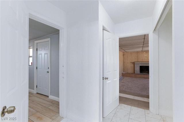 6317 Alta Dr, Las Vegas, NV 89107 - hallway with light marble finish floors and baseboards