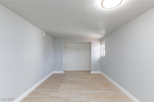 6317 Alta Dr, Las Vegas, NV 89107 - unfurnished bedroom featuring a closet and light wood-style flooring