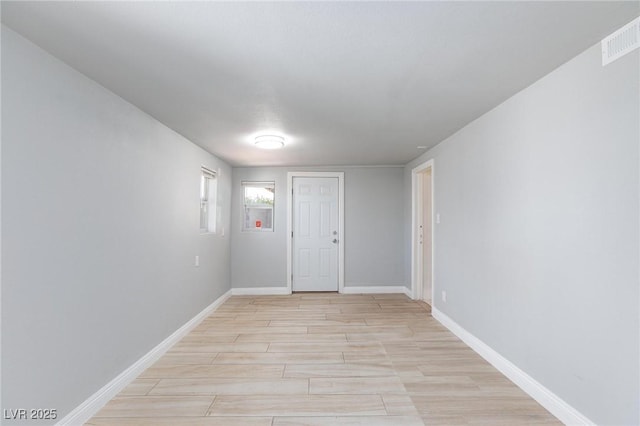 6317 Alta Dr, Las Vegas, NV 89107 - unfurnished room featuring light wood finished floors and baseboards