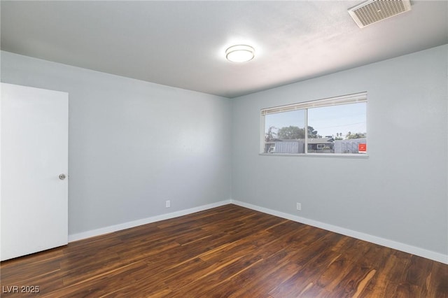 6317 Alta Dr, Las Vegas, NV 89107 - spare room featuring wood finished floors and baseboards