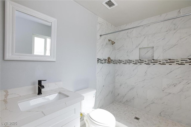 6317 Alta Dr, Las Vegas, NV 89107 - bathroom featuring vanity and tiled shower
