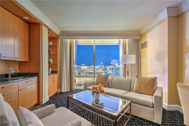 2000 Fashion Show Dr Unit 4105-4106, Las Vegas, NV 89109 - living area with dark colored carpet and baseboards