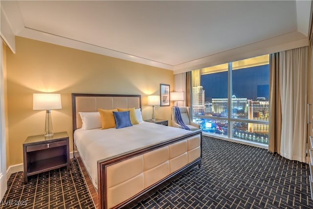 2000 Fashion Show Dr Unit 4105-4106, Las Vegas, NV 89109 - bedroom featuring brick patterned flooring and floor to ceiling windows