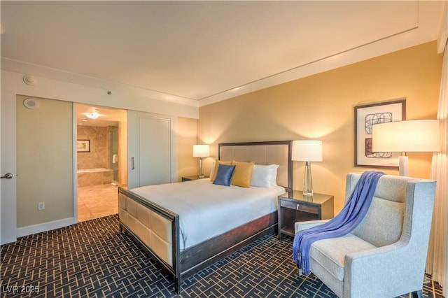 2000 Fashion Show Dr Unit 4105-4106, Las Vegas, NV 89109 - bedroom featuring ensuite bathroom and baseboards