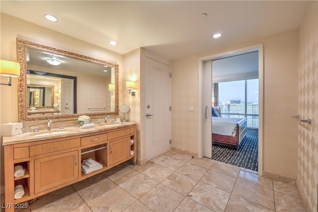 2000 Fashion Show Dr Unit 4105-4106, Las Vegas, NV 89109 - ensuite bathroom with double vanity and recessed lighting