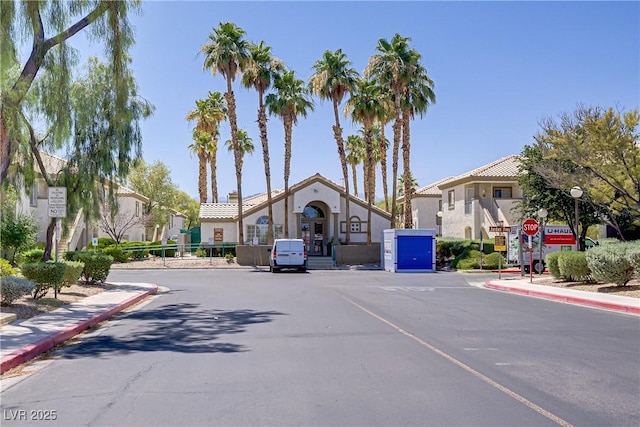 5112 Harvest Time St Unit 201, Las Vegas, NV 89130 - view of asphalt road featuring traffic signs, curbs, and sidewalks