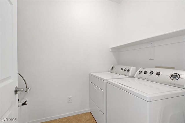 5112 Harvest Time St Unit 201, Las Vegas, NV 89130 - washroom with washer and clothes dryer and baseboards