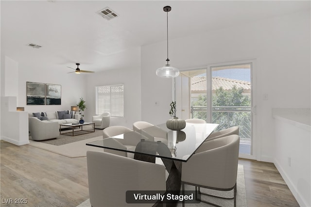 5112 Harvest Time St Unit 201, Las Vegas, NV 89130 - dining area with wood finished floors and ceiling fan