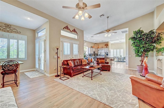 4936 Mountain Foliage Dr, Las Vegas, NV 89148 - living area with ceiling fan, healthy amount of natural light, light wood finished floors, recessed lighting, and high vaulted ceiling