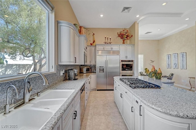 4936 Mountain Foliage Dr, Las Vegas, NV 89148 - kitchen with stainless steel appliances, healthy amount of natural light, decorative backsplash, and recessed lighting
