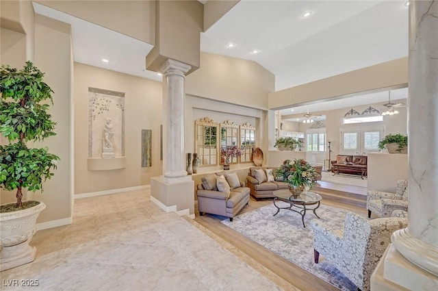 4936 Mountain Foliage Dr, Las Vegas, NV 89148 - living area with ornate columns and vaulted ceiling