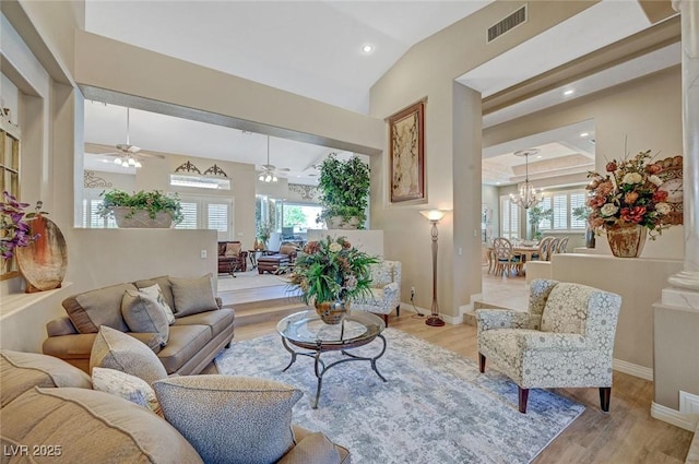 4936 Mountain Foliage Dr, Las Vegas, NV 89148 - living area with light wood-type flooring, a ceiling fan, a chandelier, recessed lighting, and vaulted ceiling