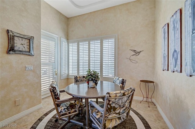 4936 Mountain Foliage Dr, Las Vegas, NV 89148 - dining space featuring inlaid floor details and baseboards