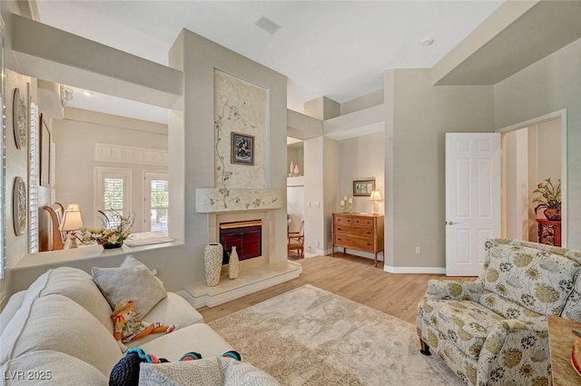 4936 Mountain Foliage Dr, Las Vegas, NV 89148 - living area with wood finished floors and a high end fireplace