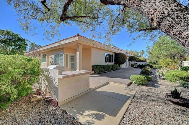 4936 Mountain Foliage Dr, Las Vegas, NV 89148 - single story home with stucco siding and a patio