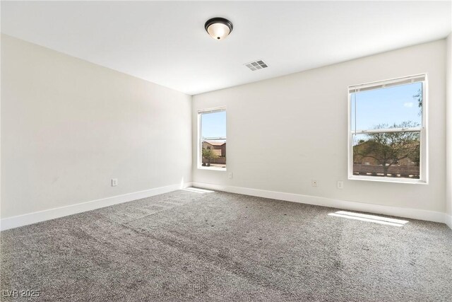 5824 Gemstone Peak St, North Las Vegas, NV 89031 - empty room featuring carpet floors and baseboards