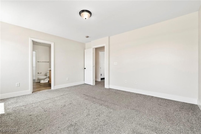 5824 Gemstone Peak St, North Las Vegas, NV 89031 - unfurnished bedroom featuring carpet floors and connected bathroom