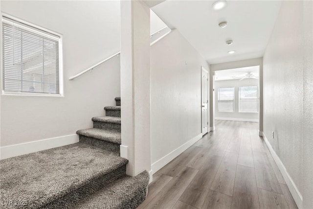 5824 Gemstone Peak St, North Las Vegas, NV 89031 - stairs with wood finished floors, ceiling fan, and recessed lighting