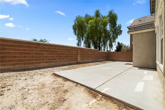 5824 Gemstone Peak St, North Las Vegas, NV 89031 - fenced backyard featuring a patio area