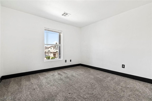 5824 Gemstone Peak St, North Las Vegas, NV 89031 - unfurnished room with carpet flooring and baseboards