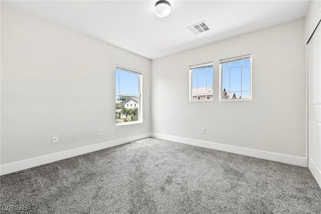 5824 Gemstone Peak St, North Las Vegas, NV 89031 - carpeted spare room with baseboards