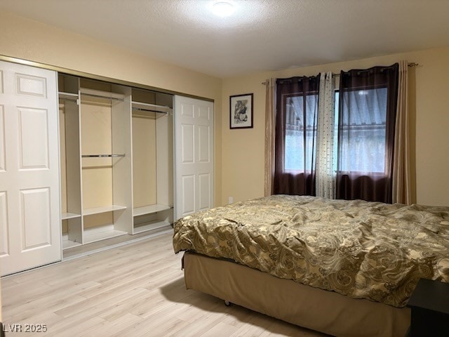 2701 Beaver Creek Ct Unit 201, Las Vegas, NV 89117 - bedroom featuring a closet and light wood-style flooring