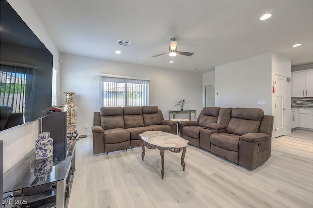 326 Zenith Crest St, Henderson, NV 89015 - living room featuring light wood-type flooring, plenty of natural light, a ceiling fan, and recessed lighting