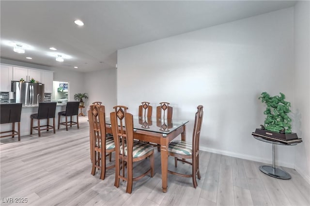 326 Zenith Crest St, Henderson, NV 89015 - dining space with light wood-type flooring and recessed lighting