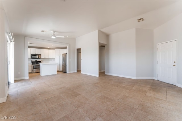 2111 Hollow Oak Ave, North Las Vegas, NV 89031 - unfurnished living room with ceiling fan and light tile patterned floors