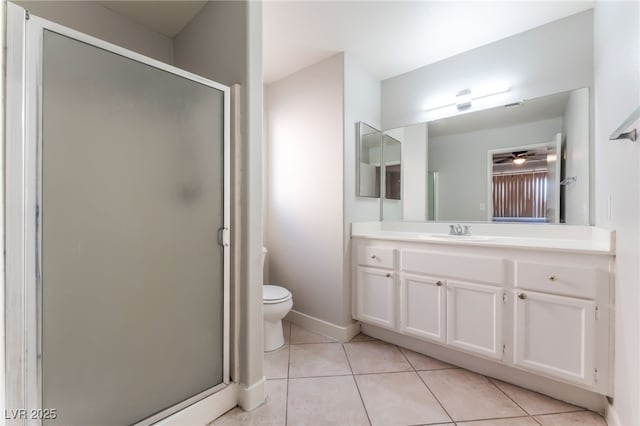 2111 Hollow Oak Ave, North Las Vegas, NV 89031 - full bathroom featuring vanity, a shower stall, and tile patterned flooring